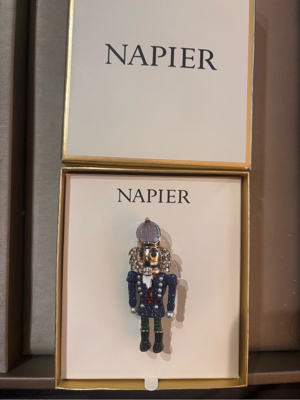 Napier Jeweled Nutcracker Pin in Navy, Green & Gold Tones